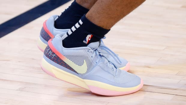 View of Ja Morant's blue, yellow, and pink Nike shoes.
